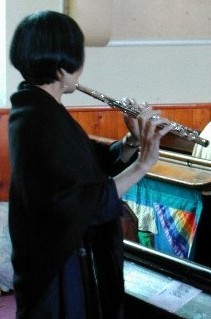 Siew-Yue playing the flute